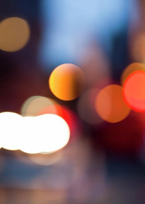 Outdoors Greeting Card featuring the photograph Defocused View Of City Lights At Night by Johner Images