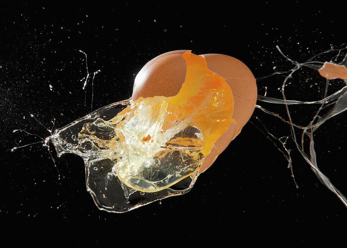 Damaged Greeting Card featuring the photograph Egg Exploding by Mike Kemp