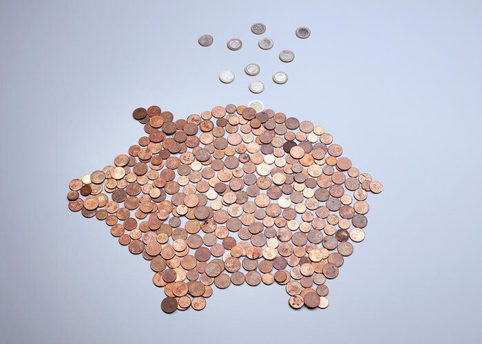 Coin Greeting Card featuring the photograph Euro Coins Falling Into A Piggy Bank by Larry Washburn