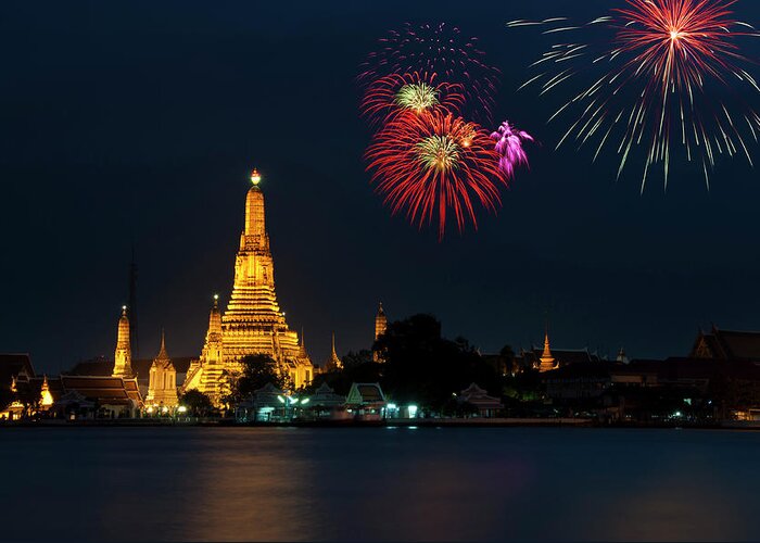 Southeast Asia Greeting Card featuring the photograph Fireworks Over Wat Arun In Bangkok by Tbradford