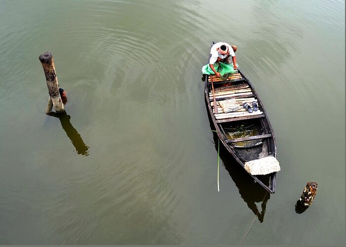 Child Greeting Card featuring the photograph Fisherman And His Boat by Pallab Seth