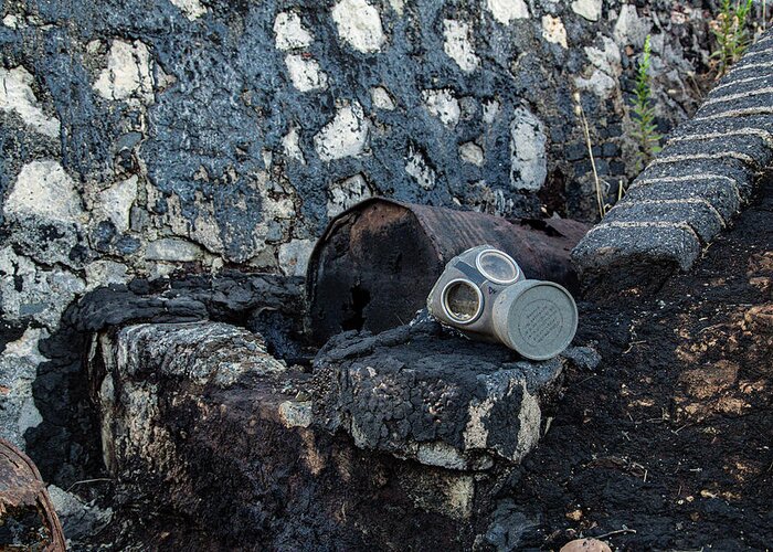 Pollution Greeting Card featuring the photograph Gas Mask On Wall And Rusty Barrel Of Crude Oil by Cavan Images