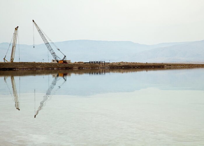Working Greeting Card featuring the photograph Heavy Machinery At The Dead Sea by Eldadcarin