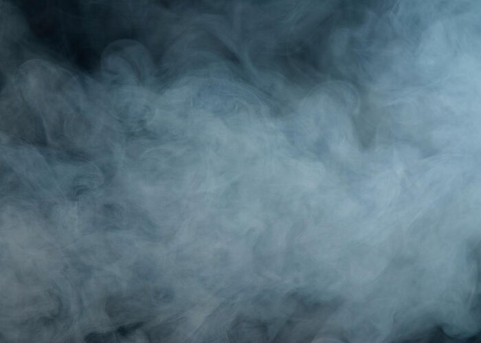 Air Pollution Greeting Card featuring the photograph Huge White Cloud Of Smoke In A Dark Room by Lastsax