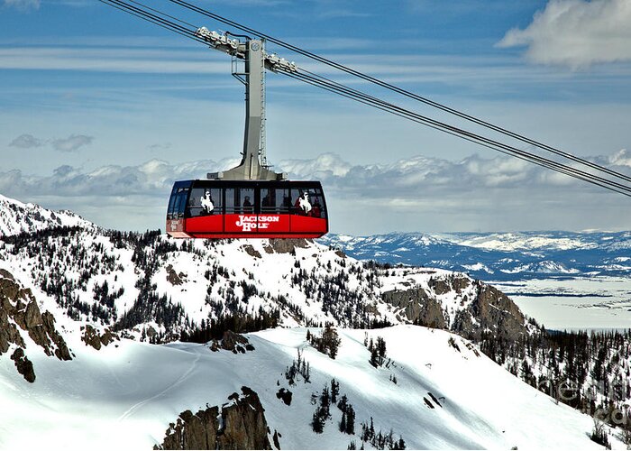 Jackson Hole Tram Greeting Card featuring the photograph Jackson Hole Aerial Tram Over The Snow Caps by Adam Jewell