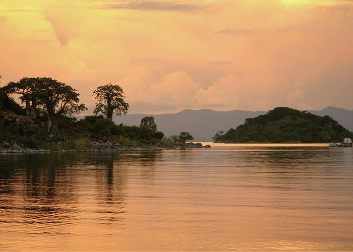 Orange Color Greeting Card featuring the photograph Lake Malawi Sunset by Christophe cerisier