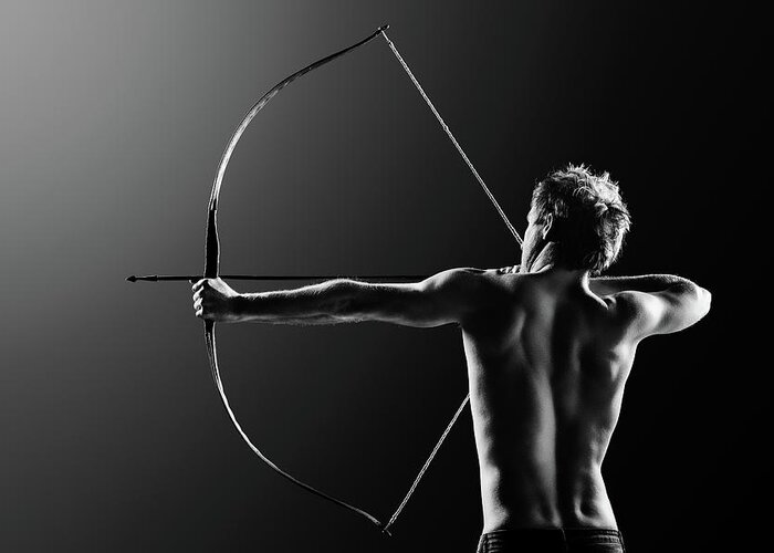 Archer Greeting Card featuring the photograph Male archer drawing long bow by Johan Swanepoel
