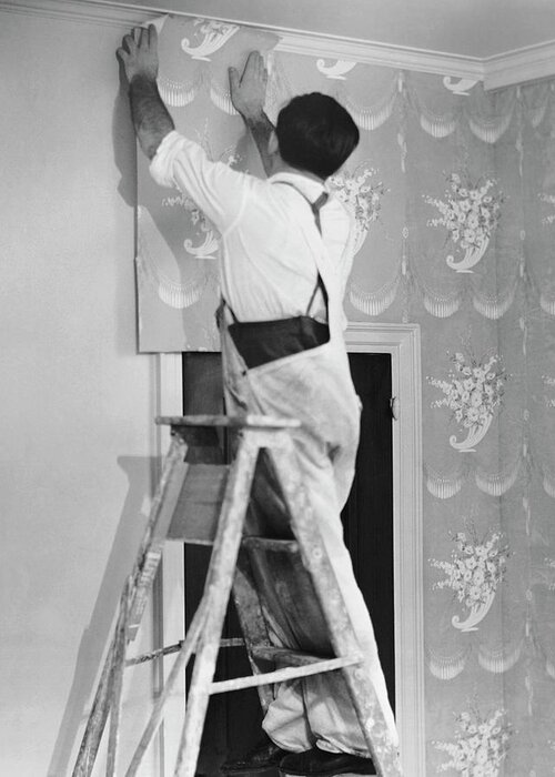 House Painter Greeting Card featuring the photograph Man Applying Wallpaper by George Marks