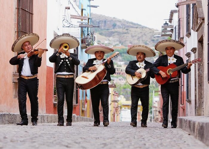 Mature Adult Greeting Card featuring the photograph Mariachi Band Walking In Street by Pixelchrome Inc