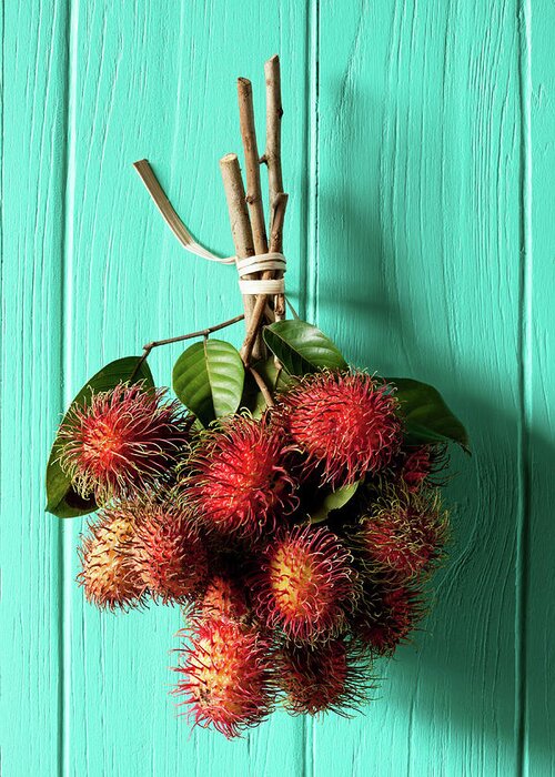 Southeast Asia Greeting Card featuring the photograph Market Fresh Thai Rambutans Hanging On by Enviromantic