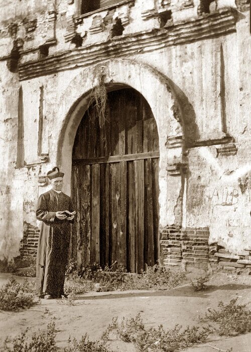 Mission Father Greeting Card featuring the photograph Mission Father at the entrance to the chapel at Mission San Diego by Monterey County Historical Society