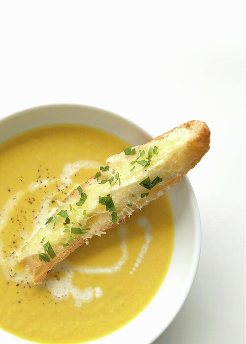 White Background Greeting Card featuring the photograph Piece Of Garlic Bread In Pumpkin Soup by Hisayoshi Osawa