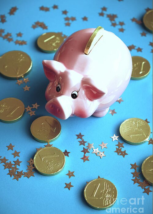 Piggy Bank On The Background With The Chocoladen Coins Bymarina Usmanskaya Greeting Card featuring the photograph Piggy bank on the background with the chocoladen coins by Marina Usmanskaya