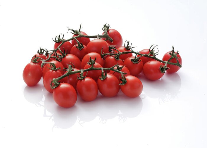 White Background Greeting Card featuring the photograph Plum Tomatoes On Vine by Chris Ted