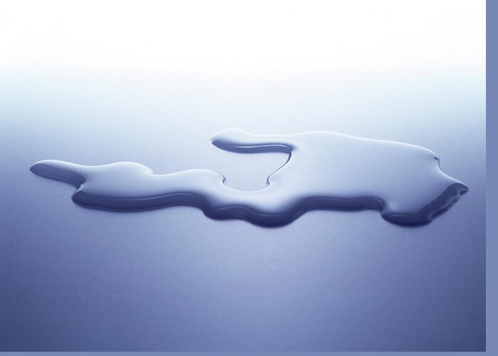Purity Greeting Card featuring the photograph Puddle Of Water On White Surface by Nicholas Eveleigh