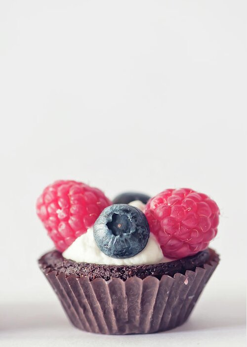 Unhealthy Eating Greeting Card featuring the photograph Raspberries And Blueberries Cupcake by Marta Nardini