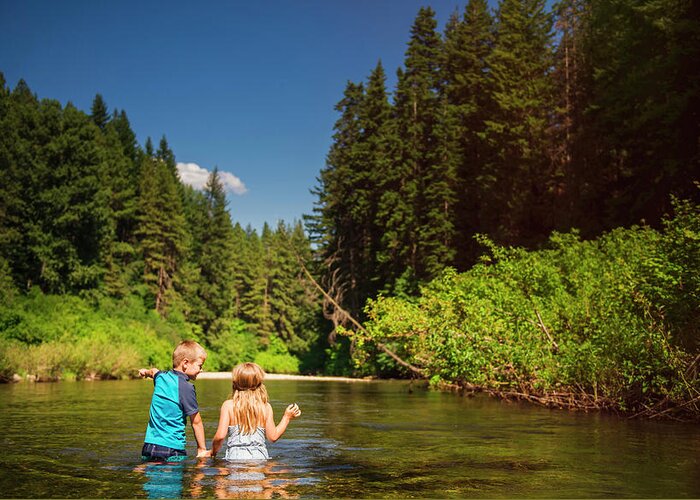 Siblings Greeting Card featuring the photograph Rear View Of Siblings Standing In River At Okanogan National Forest by Cavan Images