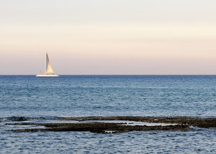 Sea Greeting Card featuring the photograph Sailing boat in the Calm Ocean by Michalakis Ppalis
