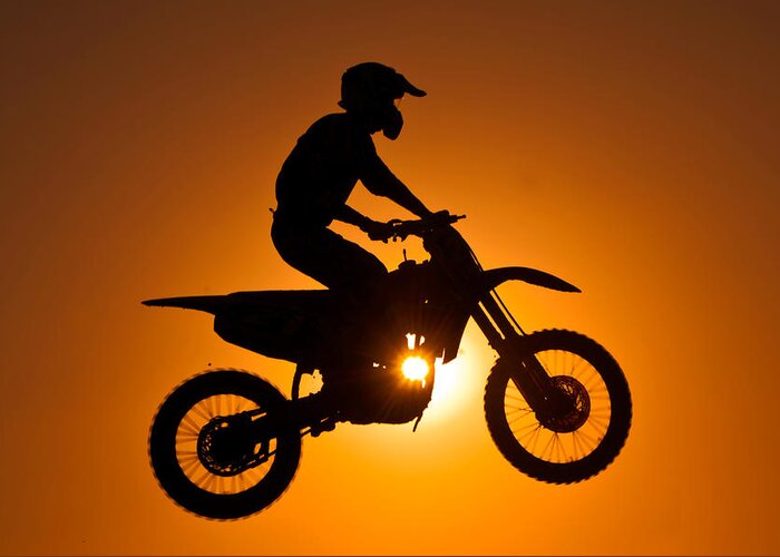 Crash Helmet Greeting Card featuring the photograph Silhouette Of Motocross At Sunset by Shahbaz Hussain's Photos
