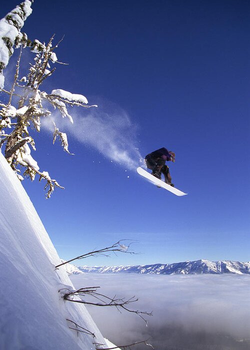People Greeting Card featuring the photograph Snowboarder In Mid-air by Comstock Images