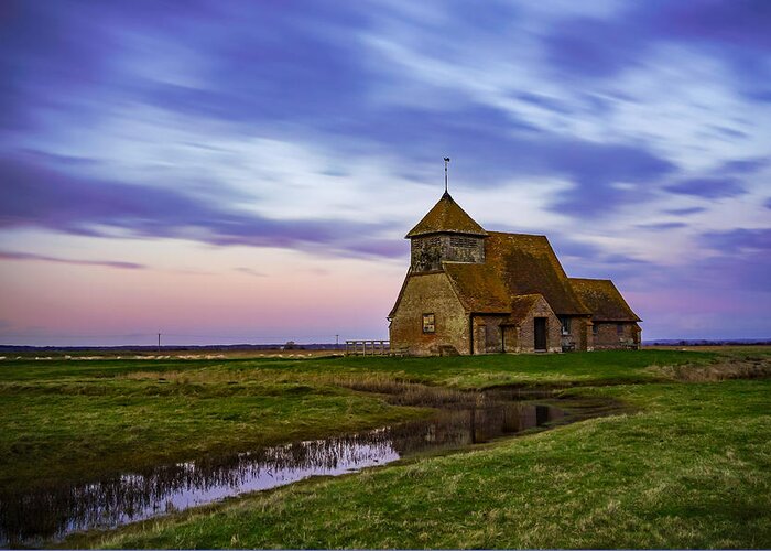 Ancient Greeting Card featuring the photograph St Thomas a Becket church in Fairfield, England, just after sunset. by George Afostovremea