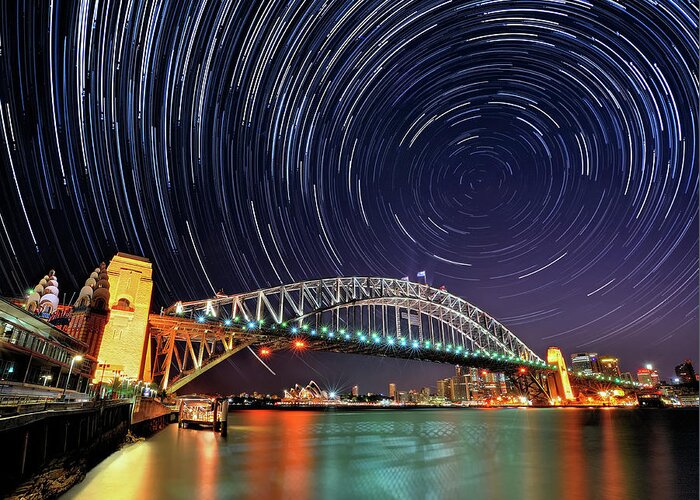 Sydney Harbor Bridge Greeting Card featuring the photograph Star-trail Over Sydney by Atomiczen