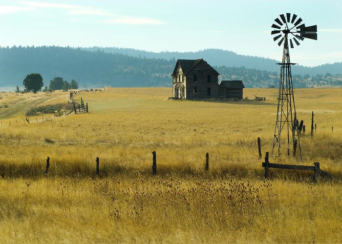 Scenics Greeting Card featuring the photograph Steinbeck Homestead W Windmill And Fence by Garyalvis