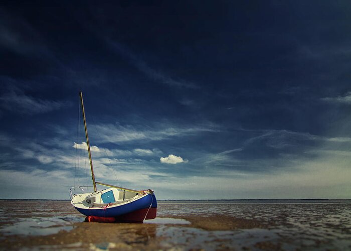 Tranquility Greeting Card featuring the photograph Stranded Boat by By Kim Schandorff
