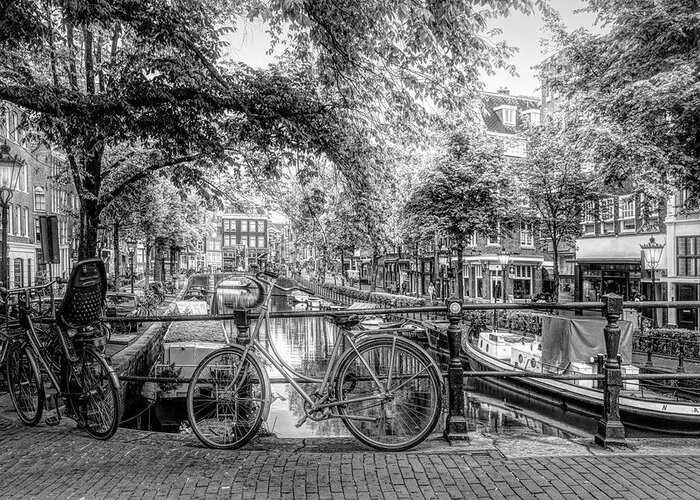 Boats Greeting Card featuring the photograph The Black Bike in Amsterdam by Debra and Dave Vanderlaan