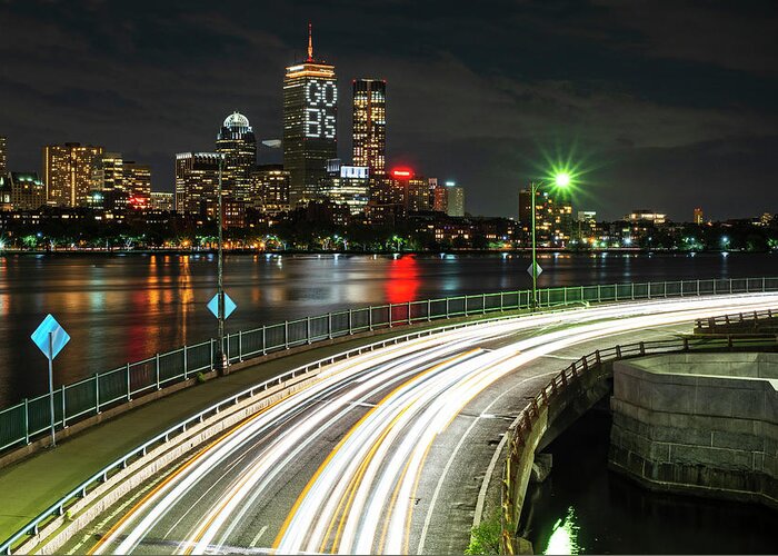 Boston Greeting Card featuring the photograph The Pru lit up for the Boston Bruins Boston MA Charles River by Toby McGuire