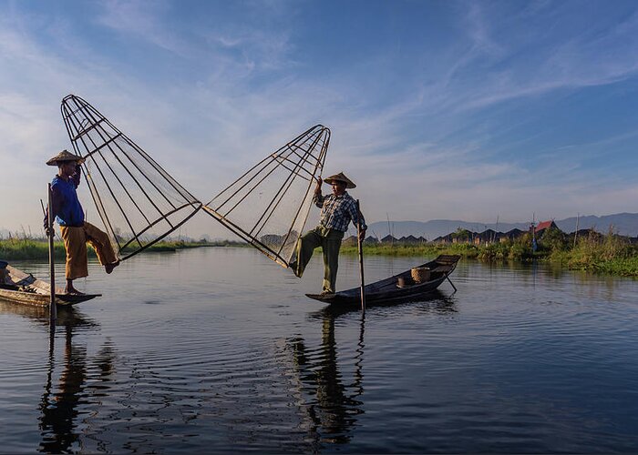 Fisherman Greeting Card featuring the photograph traditional Intha fishermen raising nets by Ann Moore