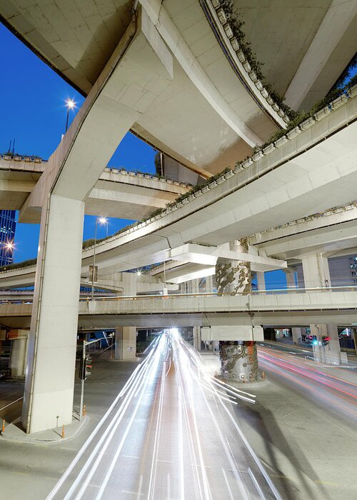 Blurred Motion Greeting Card featuring the photograph Traffic Zooming Under A Elevated by Xpacifica