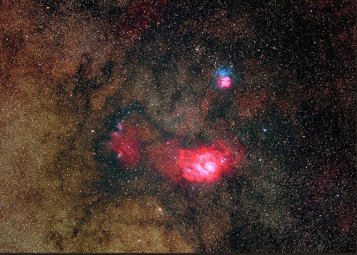Sky Greeting Card featuring the photograph Trifid Nebulae And Lagoon Nebula by Imagenavi