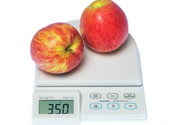 Apple Greeting Card featuring the photograph Two Apples On A Digital Kitchen Scale by Martyn F. Chillmaid/science Photo Library