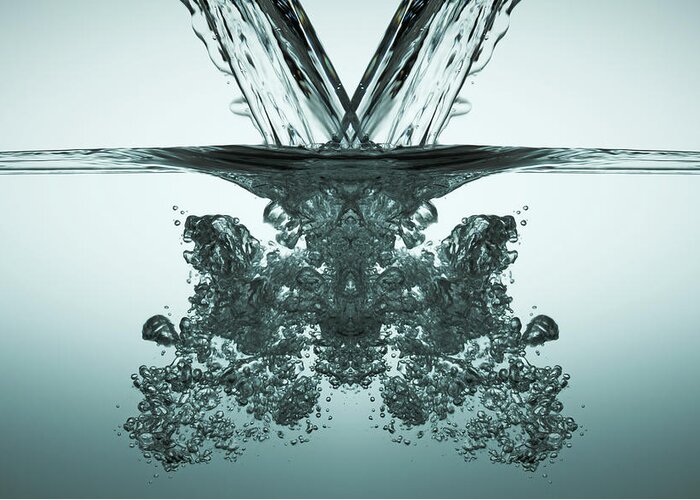Purity Greeting Card featuring the photograph Two Liquid Streams Pouring Into Water by Paul Taylor