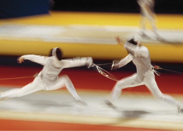 Foil Fencing Greeting Card featuring the photograph Two People Fencing Blurred Motion by David Madison