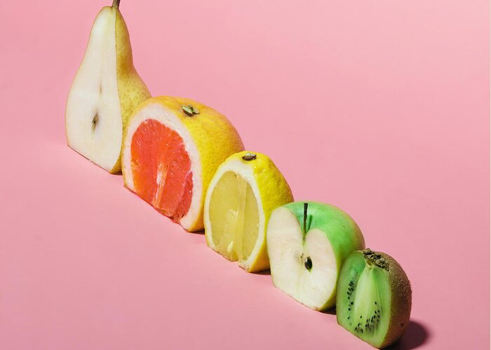 Fancy Greeting Card featuring the photograph Various Fruits Sliced In Half Minimal by Zamurovic Photography