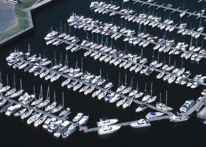 In A Row Greeting Card featuring the photograph View Of Boats In A Marina by Hemera Technologies