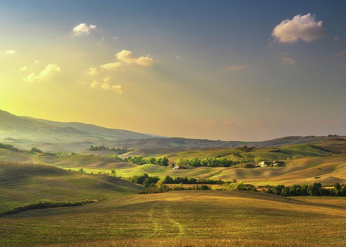 Tuscany Greeting Card featuring the photograph Volterra panorama, rolling hills, trees and green fields at suns by Stefano Orazzini