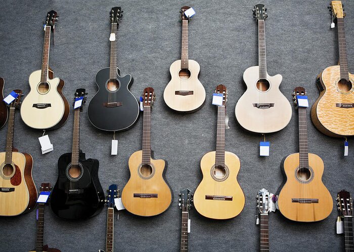 Music Greeting Card featuring the photograph Wall Of Guitars by Rapideye