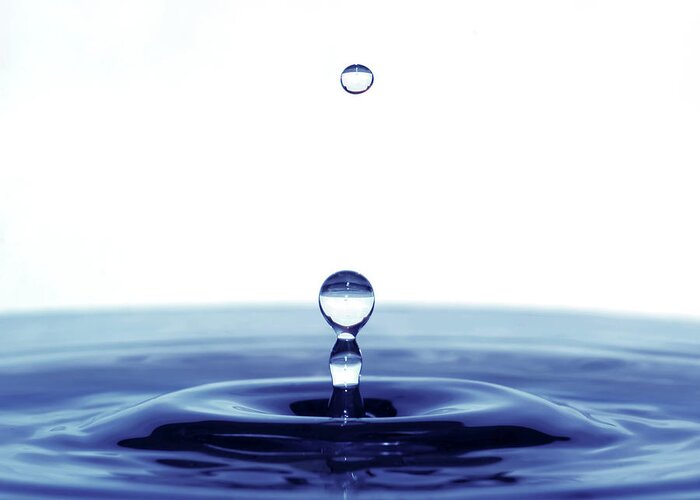 Backgrounds Greeting Card featuring the photograph Water Drop by Konradlew