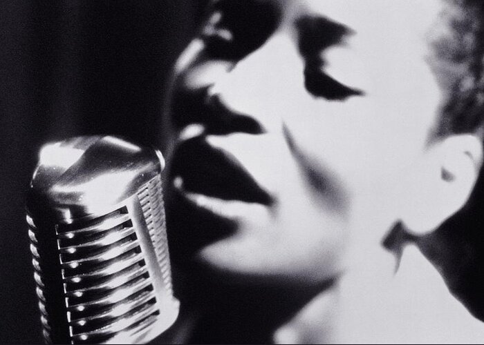 Singer Greeting Card featuring the photograph Woman Singing Into Microphone, Close-up by Nick Dolding