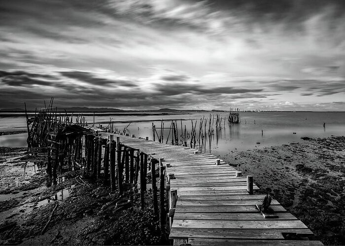 Seascapes Greeting Card featuring the photograph Wooden fishing Piers by Michalakis Ppalis