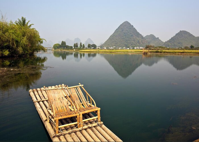 Tranquility Greeting Card featuring the photograph Yangshuo, Bamboo Raft On The Yulong by John Seaton Callahan