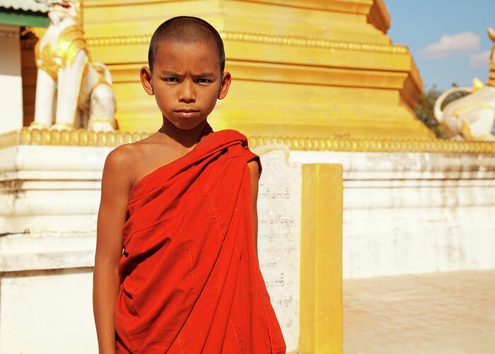 Pagoda Greeting Card featuring the photograph Young Burmese Monk In Myanmar by Danielbendjy