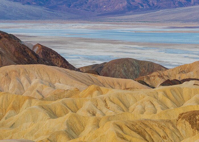 Jeff Foott Greeting Card featuring the photograph Zabriskie Point Death Valley by Jeff Foott
