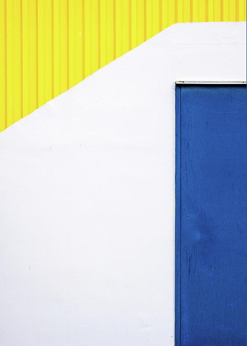 Minimal Greeting Card featuring the photograph Blue close metal door on a white and yellow wall. #1 by Michalakis Ppalis