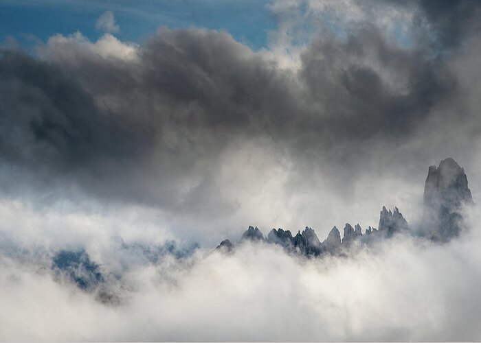 Mountain Peak Greeting Card featuring the photograph Mountain peaks between the clouds #1 by Michalakis Ppalis