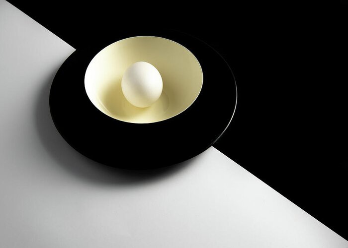 Still-life Greeting Card featuring the photograph Single fresh white egg on a yellow bowl by Michalakis Ppalis