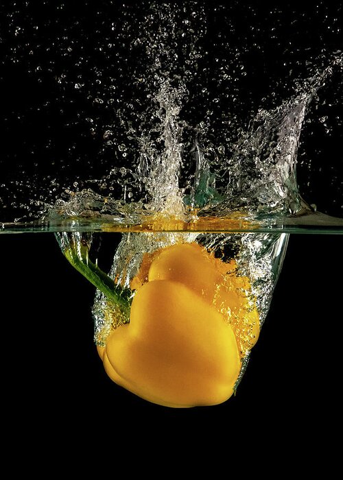 Pepper Greeting Card featuring the photograph Yellow bell pepper dropped and slashing on water by Michalakis Ppalis